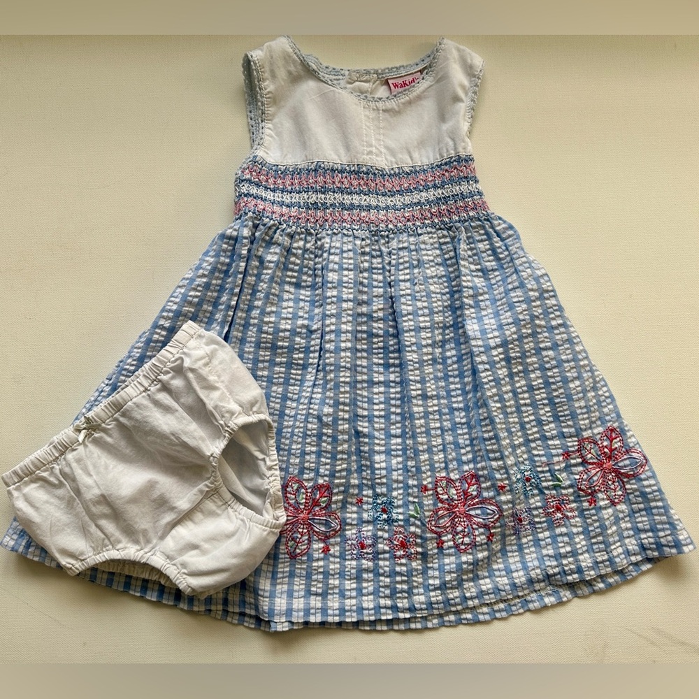 Waki girl’s dress is a sleeveless, embroidered & Gap bloomers.  Size 18-24M.